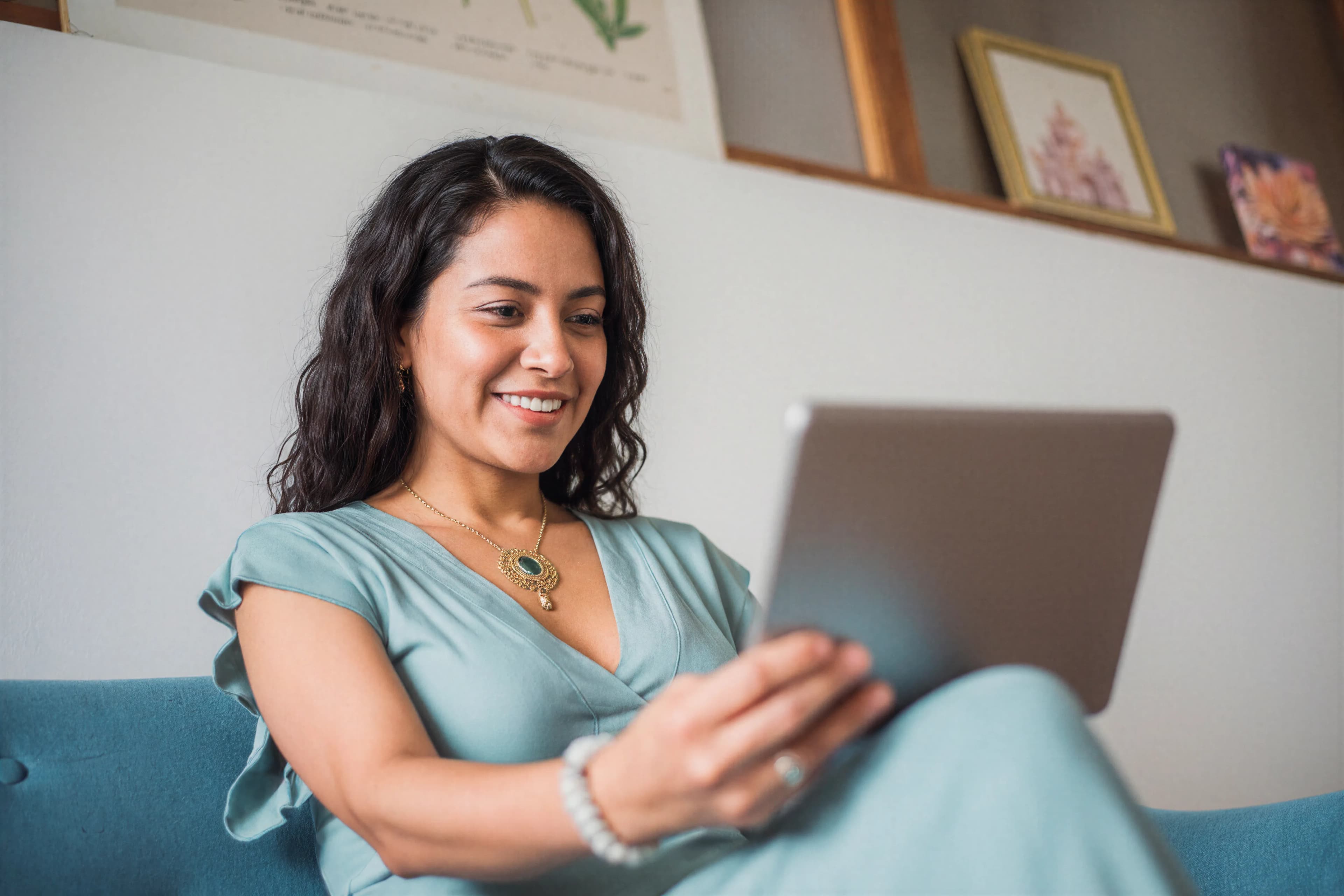 Woman using a tablet for an online consultation